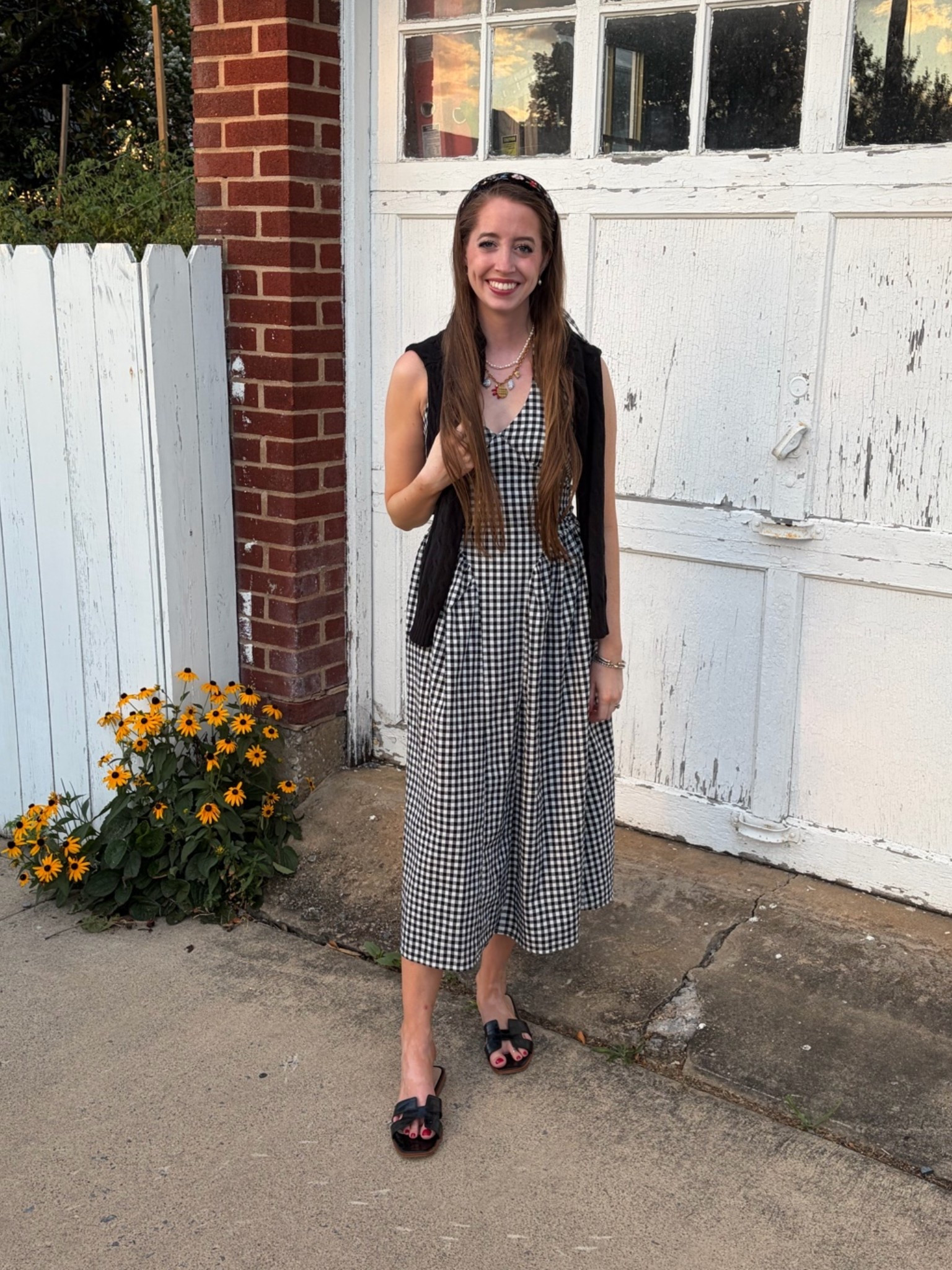 Love this gingham halter dress from Amazon! True to size, but I sized down to an XS because I have small boobs and the back is smocked so sizing is flexible! 
Amazon finds 
Black sandals
Black cable knit sweater

#LTKSeasonal #LTKSaleAlert