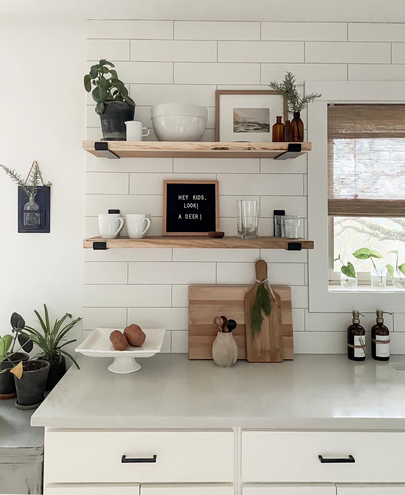 I like to add little sprigs of greenery from your clippings, the Christmas tree or from my walks to make little things look festive. I’ve added some here to vases bottles and tied to the cutting board for kitchen Christmas decorating

#LTKHoliday #LTKHome #LTKSeasonal