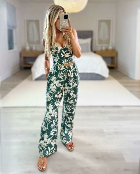 Abercrombie Matching Set on SALE 🌴🌺✨

Abercrombie linen shorts, linen pants, + tank tops are a part of the LTK Spring Sale March 8th-11th. Abercrombie is 20% OFF site wide with the exclusive LTK code!

I’m wearing an XS Short in the green floral linen pants. I’m 5’1.5” and they were the perfect length with sandals. I would do the XS Regular length if I wanted to pair the linen pants with heels or wedges. These pants are high rise wide leg pants made of lightweight, breathable material. They have a stretchy waistband for comfort and adjustability. 

I’m wearing an XS  in the green floral linen v-neck tank top. It has stretchy material along the back and adjustable straps. 

I’m an XS in the linen floral shorts.

I love mixing and matching this linen set. Pull the pants on with a bikini or crop top for a casual style around the resort. Or pair it with its matching tank top and wedges for a more elevated look. This tank top could also be worn casually with a pair of denim shorts. 

These linen sets come in a variety of colors and prints as well as sizing options- short, regular, long. 

Spring Outfits, Abercrombie Outfits, Vacation Outfits, Resort wear, Linen shorts, Linen Pants, Summer Outfits, LTK Spring Sale, Petite Outfits, Trending Outfits, Elevated Casual Outfits, Spring Fashion, Vacation Style, spring trends, vacation outfit, petite style, spring style, resort wear, floral shorts, linen shorts, comfy shorts, pull on shorts, lightweight shorts, spring shorts, summer shorts, beach coverup, green tank top, green spring outfit, resort outfit, neutral bag, tan crossbody, green crop top, floral crop top, summer shoes, summer sandals, linen pants, floral pants, neutral pants, green pants, light pants, neutral outfit, neutral style, beach bag, tote bag, neutral tote bag, summer neutral outfit, spring neutral outfit, spring floral outfit, brunch outfit, travel outfit, beach outfit, Abercrombie outfit, Abercrombie sale, matching set, two piece set, short set, linen set, pant set, vacation set, summer set, spring set, green floral outfit

#LTKstyletip #LTKtravel #LTKSpringSale