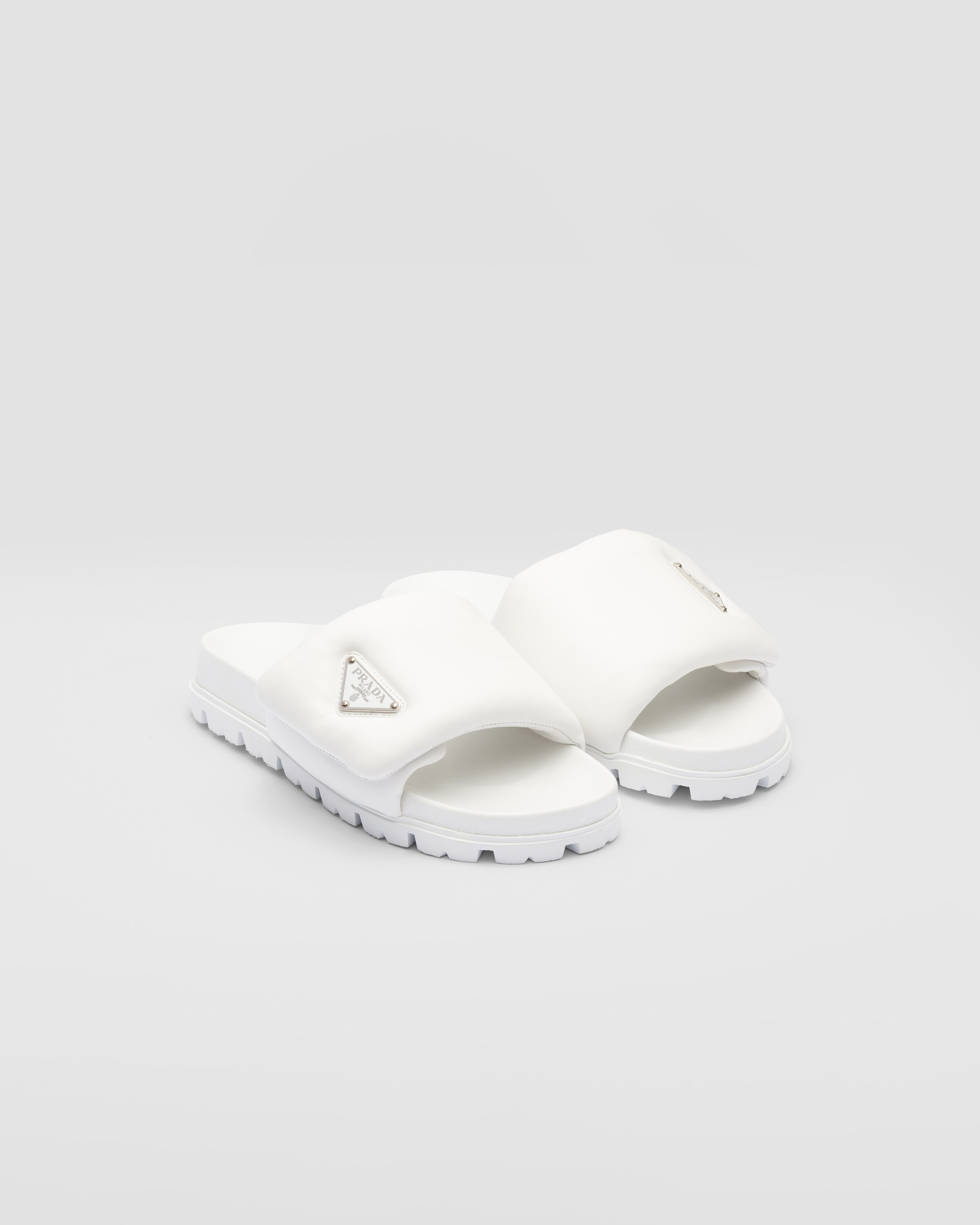 Soft padded nappa leather slides | Prada US
