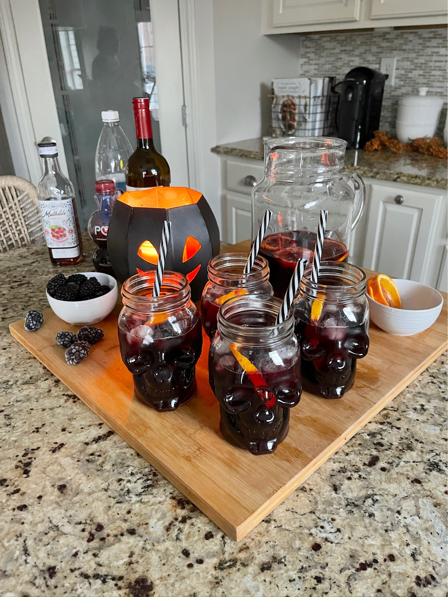 The skull glassware is the perfect touch for the spooky season 💀 

Save this recipe:

SPOOKY SANGRIA

1 cup blackberries
2-3 blood oranges
1/2 cup raspberry liqueur
1 bottle red wine
1 cup pomegranate juice
2 cups club soda

Combine muddle blackberries, blood orange slices, and liqueur - stir. Add in bottle of wine, pomegranate juice, juice of one blood orange, and club soda. Stir & pour into your spooky glasses with a little fruit garnish!

Halloween party, skull glasses, spooky home decor, pumpkin decor, halloween home

#LTKparties #LTKHoliday #LTKHalloween

