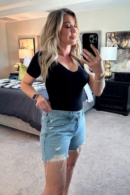 I SIZED UP 2 sizes!  I finally found a pair of denim shorts I like! This happens only once every couple years- no lie. It’s so hard for me to find shorts I like. 
These fit great thru the hips & butt. Long enough to cover my butt and I do not feel frumpy in them. 

I sized up 2 sizes. I’m typically a size 28, I’m wearing a 30. I always size up 1 size in shorts. I decided to go up 2 sizes in these to make sure they are a little loose in the waist  