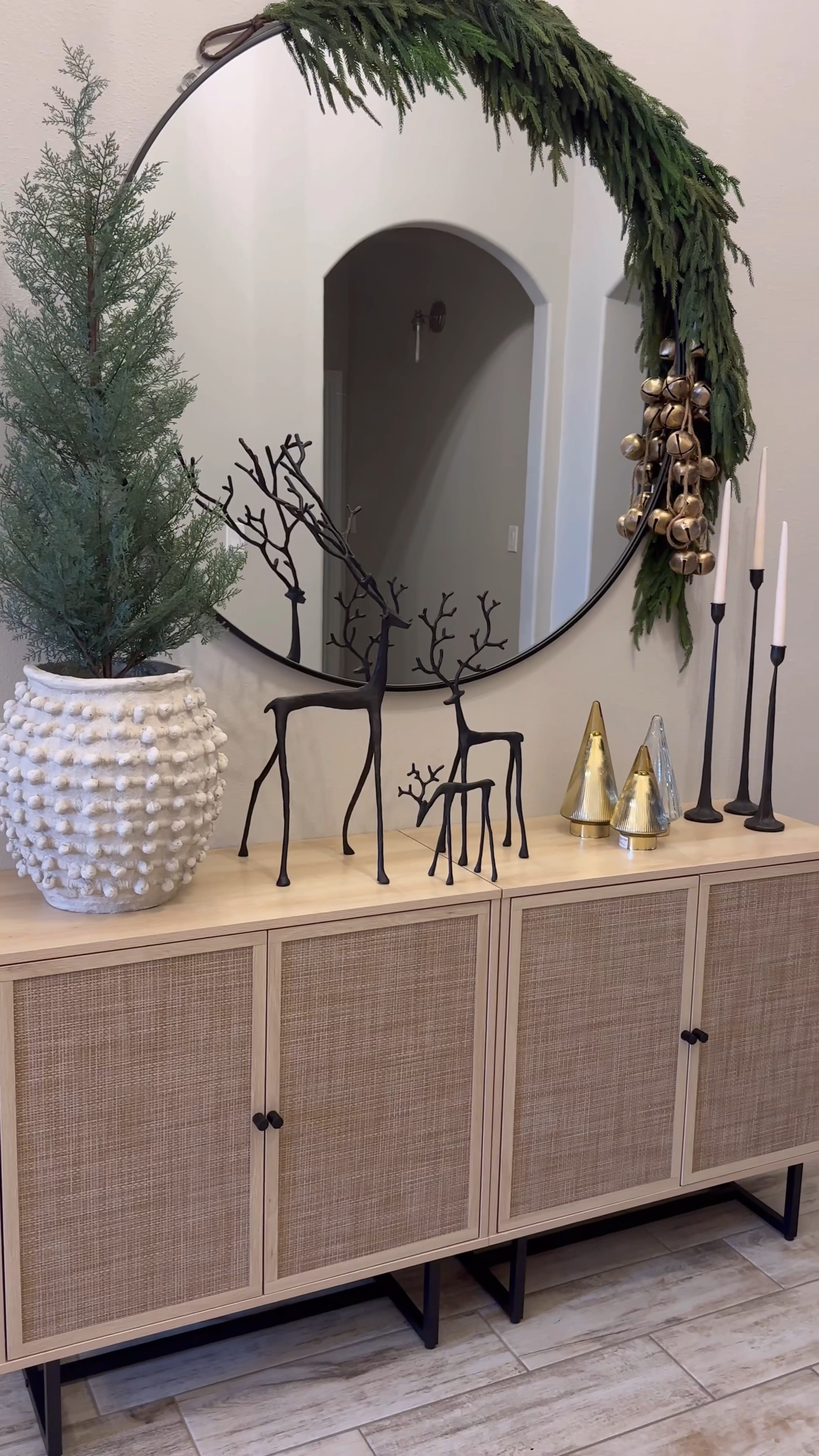 Sideboard styling for Christmas with Nathan James kova cabinets 
Pottery barn Christmas, minka pots, Anthropologie, iron candle sticks, target Christmas, studio McGee, Kirkland garland, Norfolk garland, brass bells, Christmas tree, Christmas reindeer 

#LTKhome #LTKHoliday #LTKSeasonal