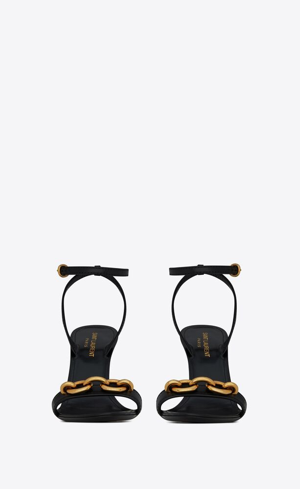 almond-toe sandals decorated with a cable-link chain detail at the front, featuring a stacked hee... | Saint Laurent Inc. (Global)