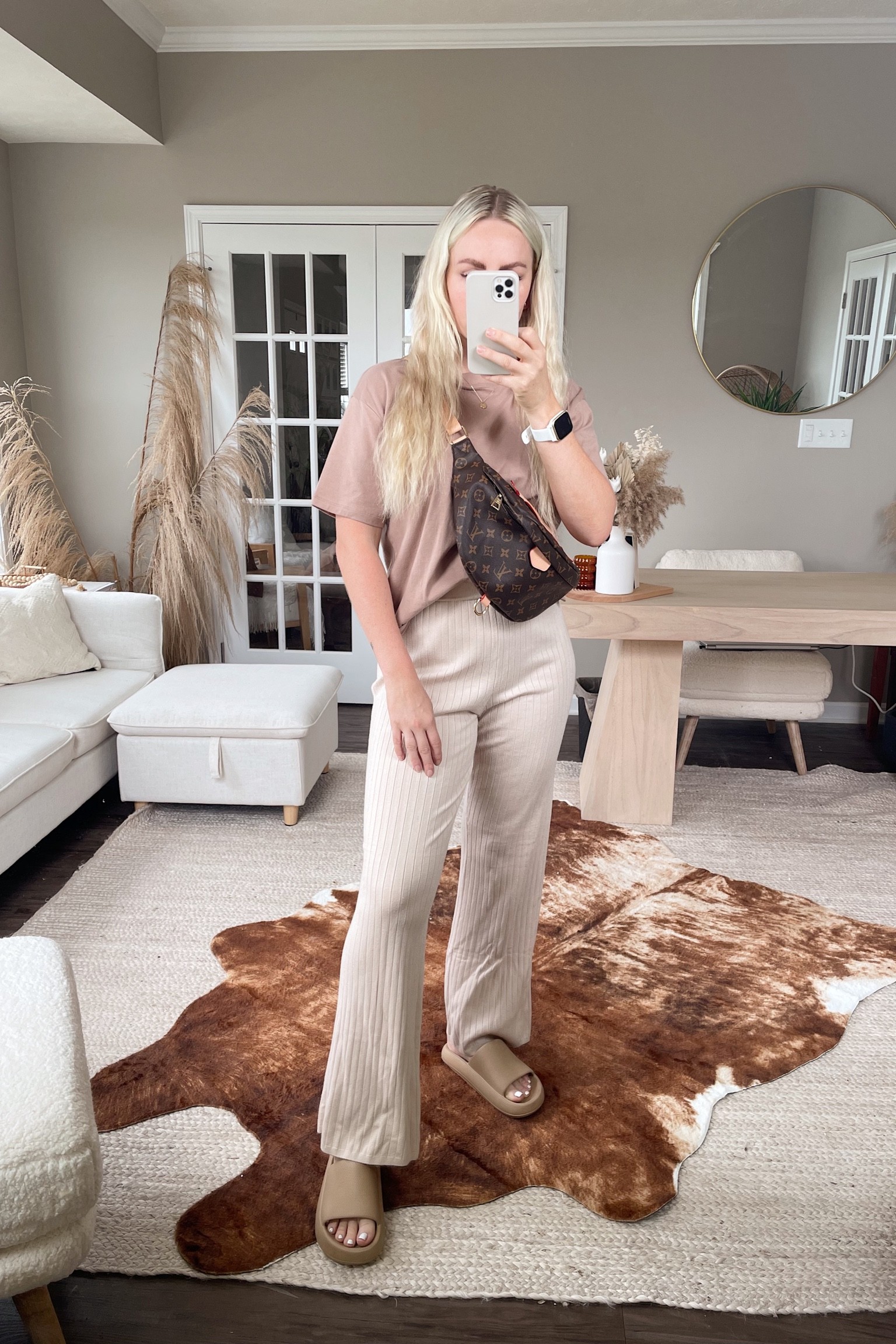 Neutral look featuring #abercrombie . Wearing size S in basic t shirt and S in knit lounge pants. Pants are on sale for $14.99! Also, can’t go wrong with my favorite slides from #amazon. 

#LTKshoecrush #LTKsalealert #LTKstyletip