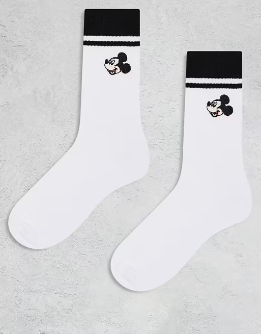 ASOS DESIGN 2 pack Mickey Mouse socks with black stripes in white | ASOS (Global)