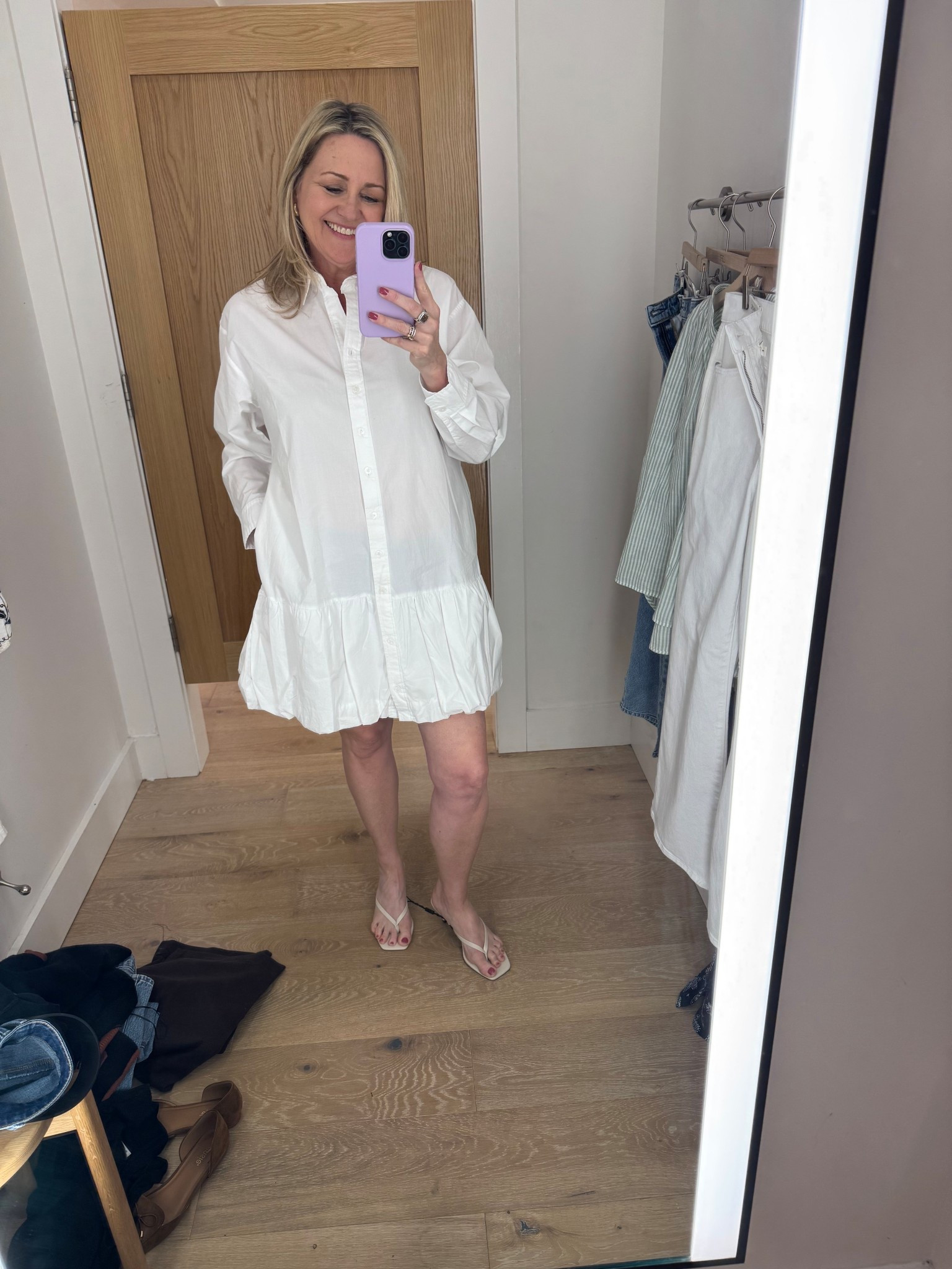 Love this white button down dress with a bubble hem!  Spring dress, simple spring style, thong sandals 

#LTKOver40 #LTKSeasonal #LTKootd