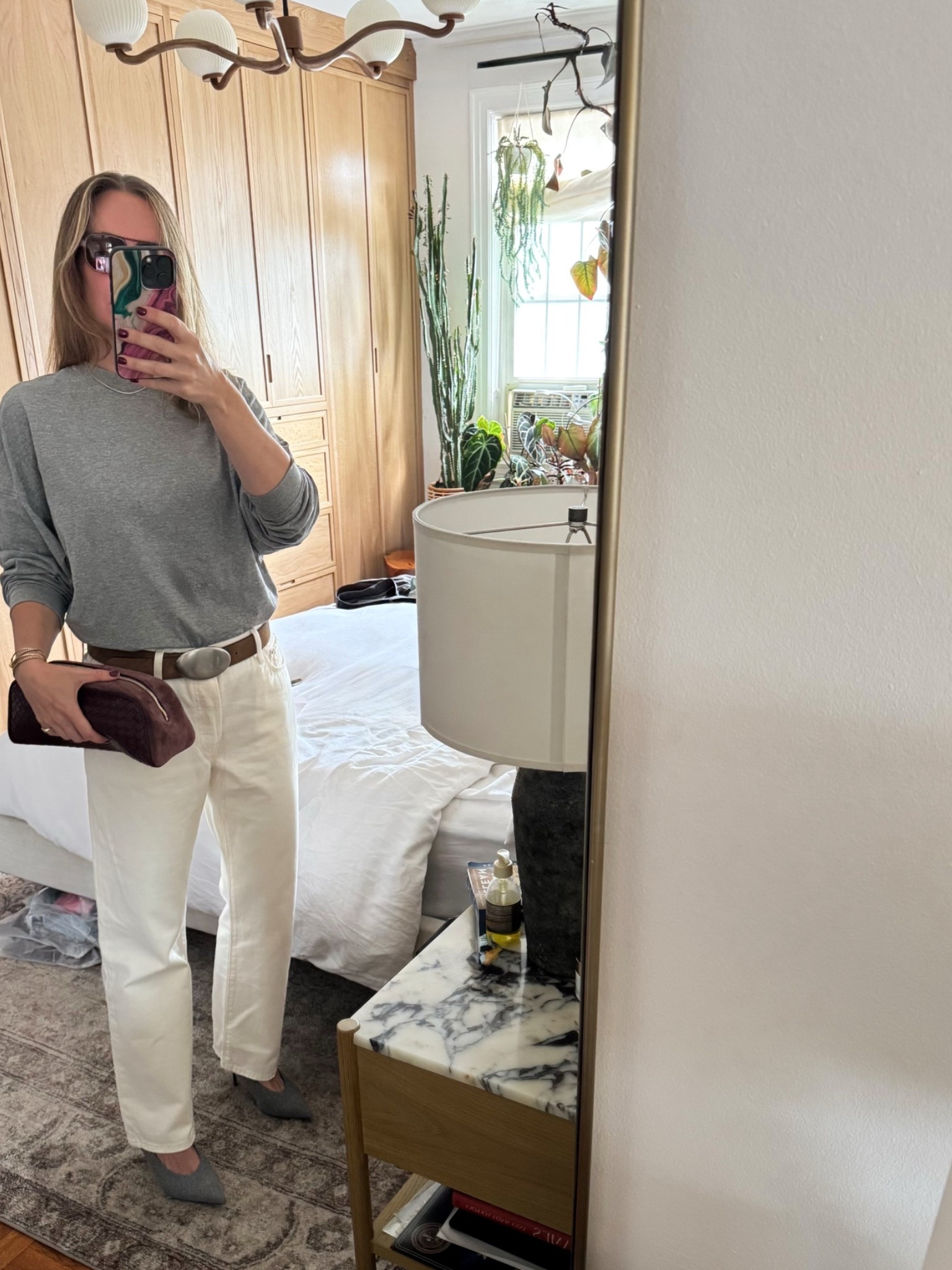 About the outfit:
+My long sleeved tee is H&M. The color is from last year, but they just released a darker grey and white again. I'm wearing a medium. 

+ The denim is my favorite pair to transition into winter whites. I size up one for a looser fit.
+ I love this belt! True to size. Wearing a M.
+ the shoes run true to size.

#LTKootd #LTKOver40