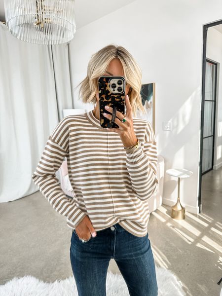 This striped sweater will be on repeat for me this fall! Pair it with leggings or denim! I am wearing an XS! 

Loverly Grey, fall outfit 

#LTKfindsunder100 #LTKSeasonal #LTKstyletip
