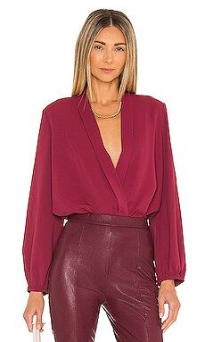 Amanda Uprichard Long Sleeve Hera Bodysuit in Malbec from Revolve.com | Revolve Clothing (Global)