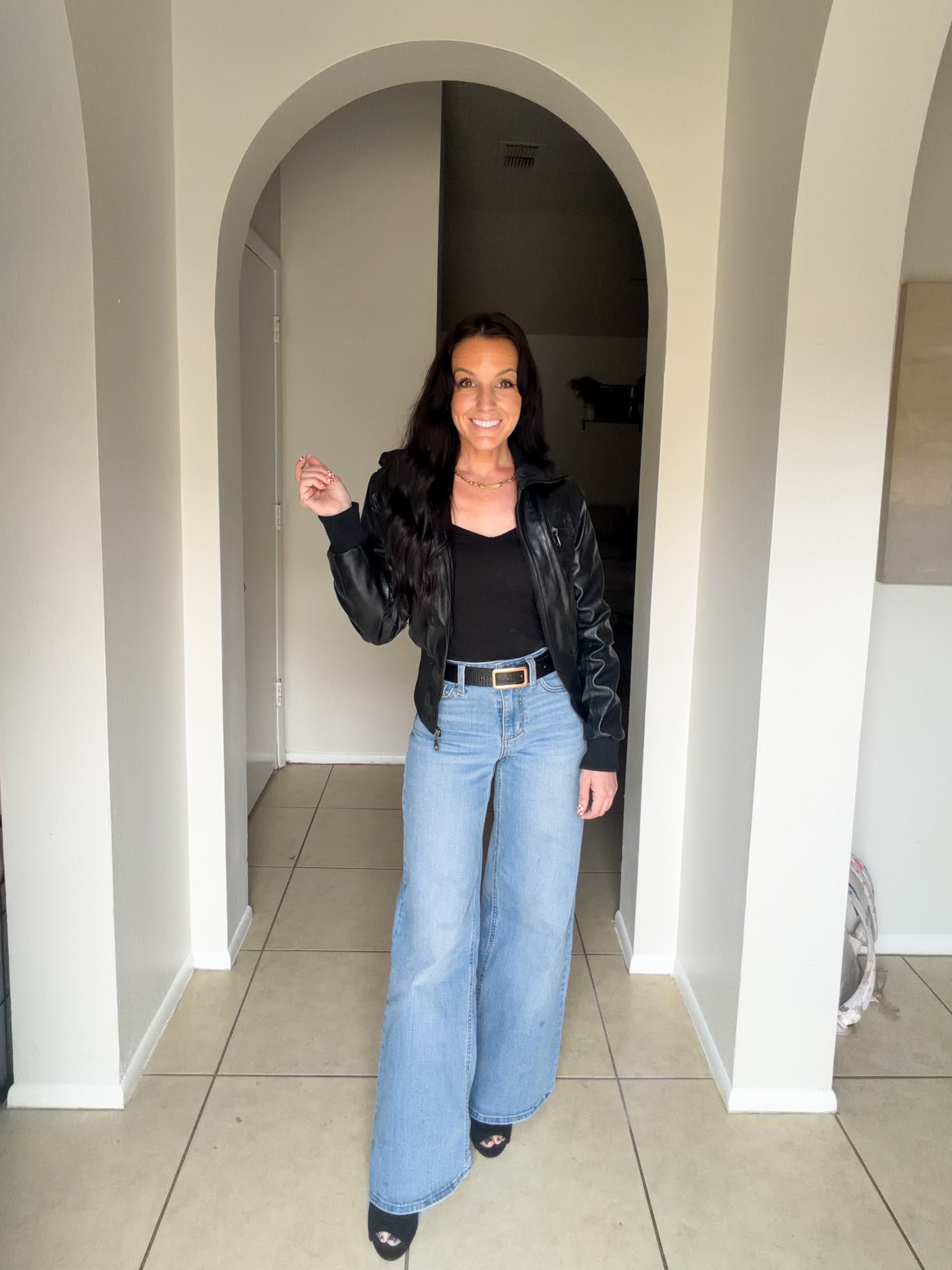 Black leather jacket 
Target wide leg jeans 
Black heels
Gold bar necklace 
Checker nails 
Black and gold belt 


#LTKmomlife #LTKgrwm #LTKootd