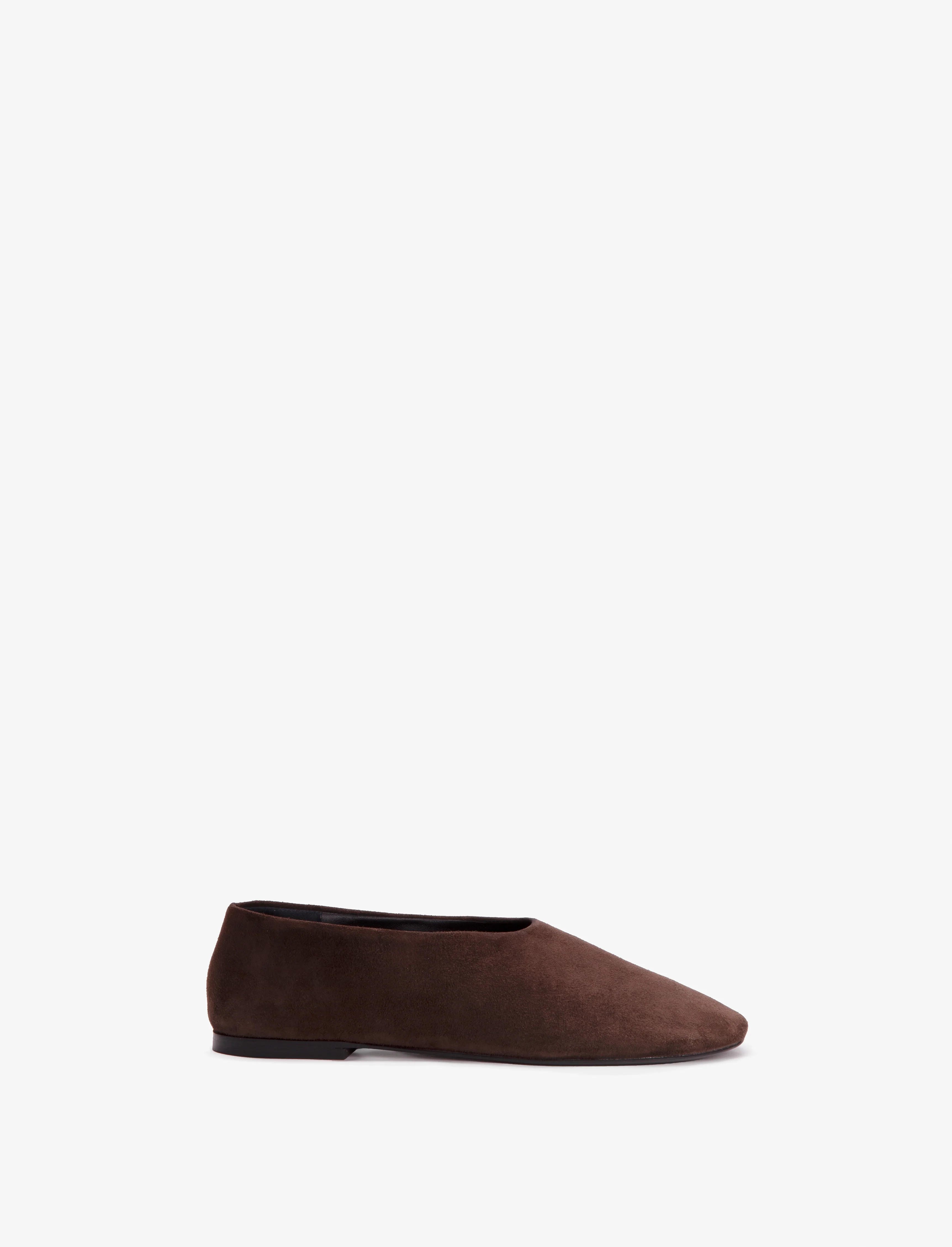 The Glove Slippers are crafted with kidsuede along the upper. Features a round toe, slip-on silho... | Proenza Schouler LLC