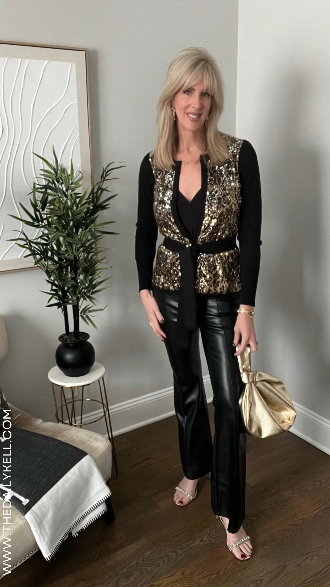 NYE outfits don’t have to be uncomfortable. These faux leather pants @7forallmankind are beyond comfy, not to mention ultra slimming.  Wearing size 6. 

My cardigan is an investment staple by @roberto_cavalli that I love paired with an @express tank in size small.  I’ve elevated this look with @badgleymischka heels with pearl and rhinestone details.  The accessories were purposely left a bit simpler in order to showcase this sequin sweater.   

Earrings are @jcrew  under $10 and my handbag is a faux leather gold pull through strap from @amazonthedrop 

Check back this weekend for 2 more NYE looks wearing these same pants.  Each one more casual but equally as festive and comfy.  

#outfitinspo #outfitinspiration #ootdfashion #outfitoftheday #outfitideas #styleinspo #casualstyle #ottdfashion #ootdstyle #dailylook #fashionstyle #ootdinspiration #outfitsideas #outfitstyle #over50style #over40style #nyeoutfit #newyearseveoutfit #highlowfashion #mixedfashion 

#LTKover40 #LTKHoliday #LTKU