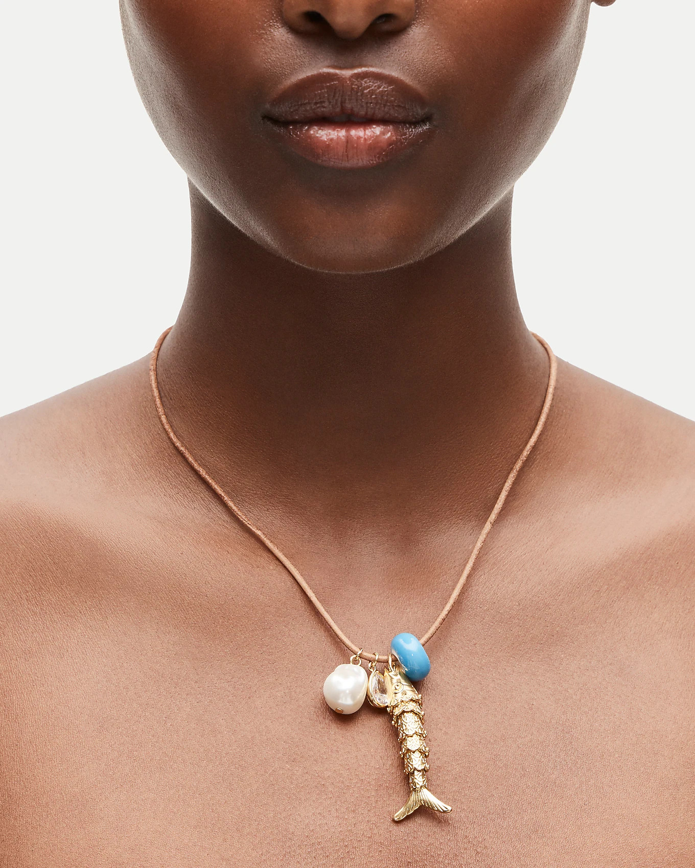 Fish pendant necklace on leather cord | J. Crew US