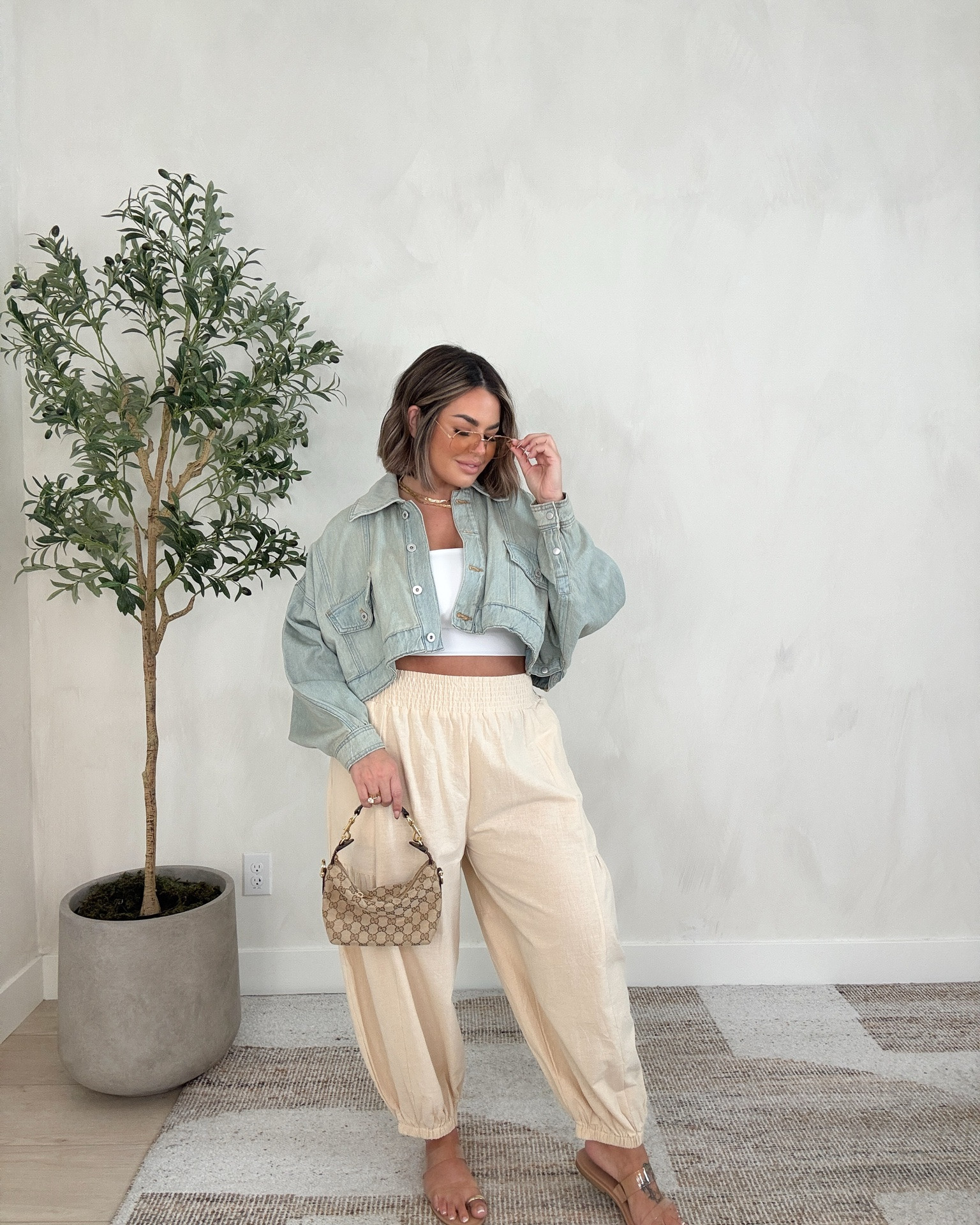 Splurge worthy denim jacket. 

I have been hunting for a look for less but haven’t found a good one yet. 

This is REALLY oversized I’m wearing the XS/S and it’s still big so def size way down. 

Pants xl 
Tube top linked similar one I also have in a L 

Sandals are old but linked similar .

My everyday necklaces are 40% off this weekend only for Memorial Day grab them now if you have been wanting them they never do 40% off !
