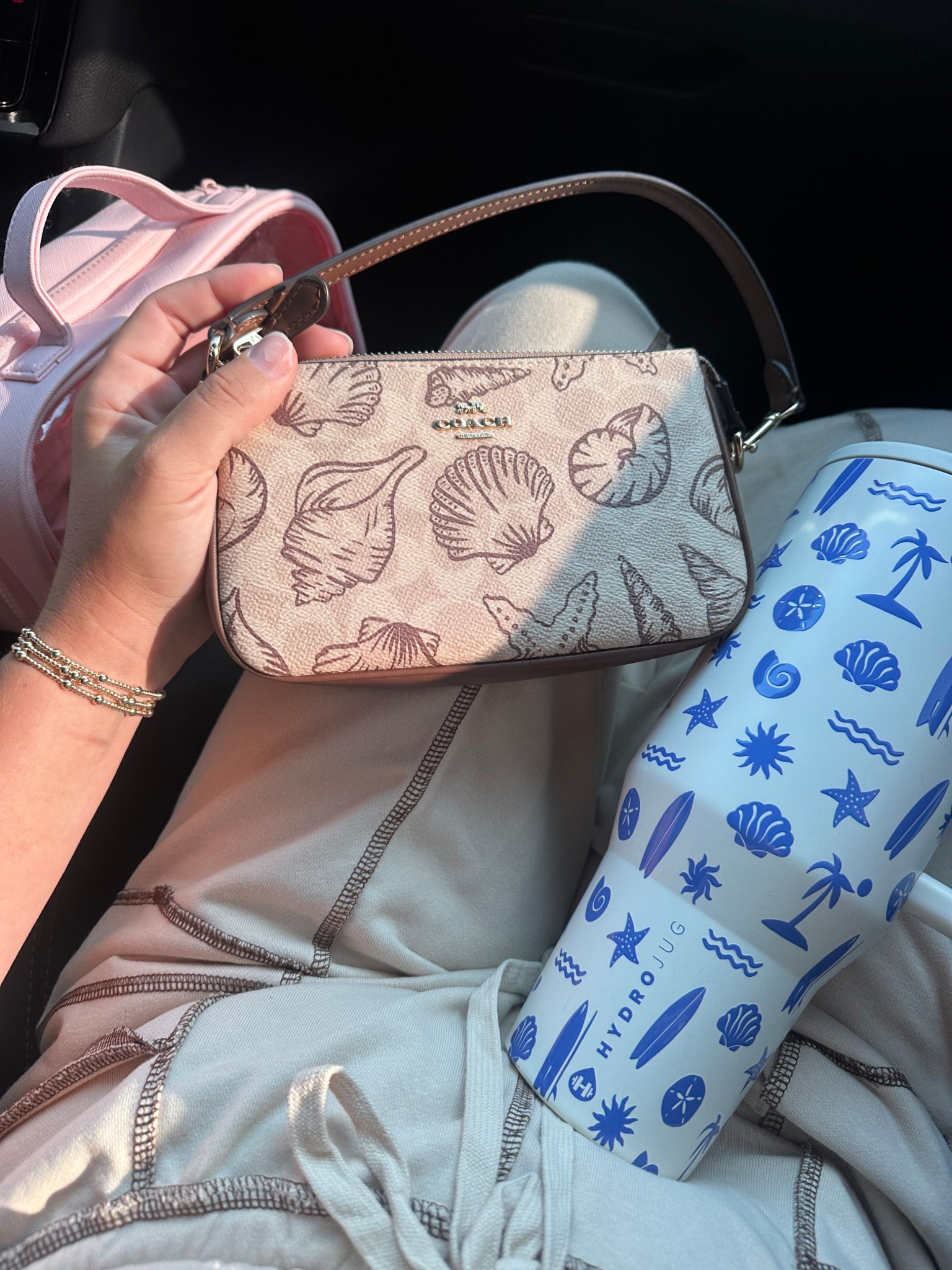 COASTAL VIBES | COACH SUMMER DROP | COACH SEASHELL PURSE | HYDROJUG #hydrojug #coastalvibes #coachpurse #seashellcoach 

#LTKSeasonal #LTKStyleTip