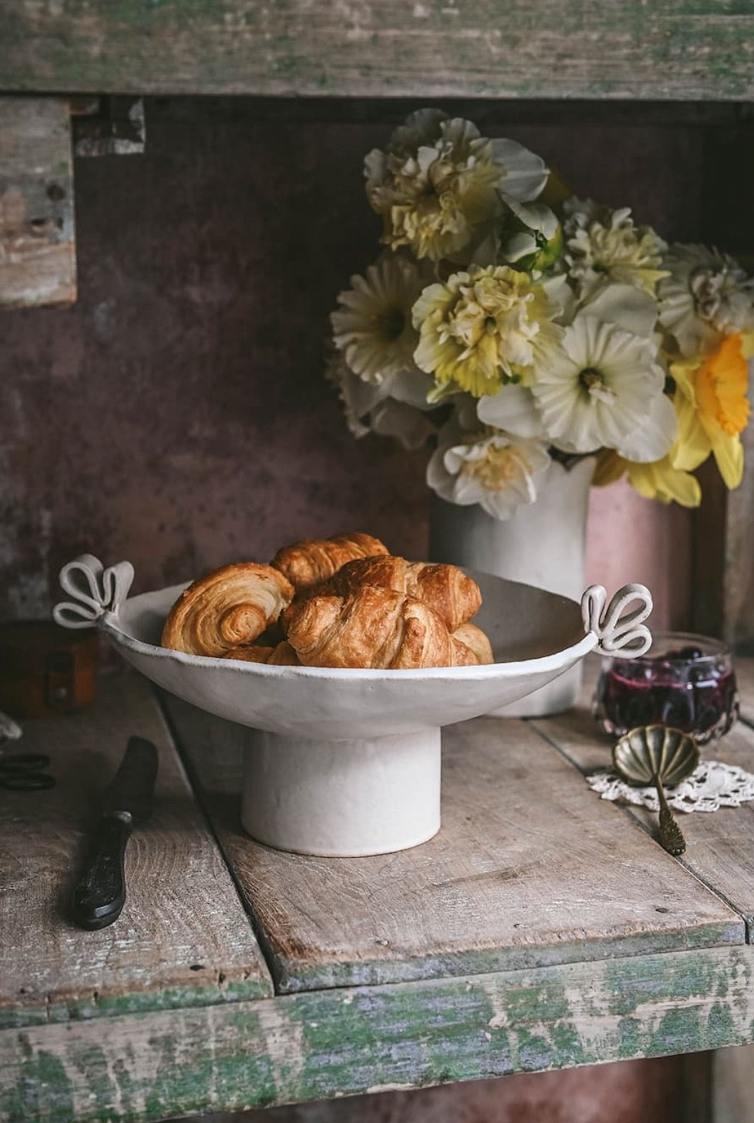 Ceramic Pedestal Bowl
Beautiful handmade pedestal bowl😍

“A piece that feels both classic and quietly sculptural. This ceramic pedestal bowl elevates whatever it holds, from fresh fruit to baked goods or everyday objects around the home. Crafted to be used often and enjoyed daily, it brings a little beauty to the most ordinary moments. Each one is shaped, glazed, and finished by hand, so no two are exactly alike.”

approximate size: 9" diameter, 3.5" tall (not including handles)
hand wash
food-safe
handmade in the U.S.  