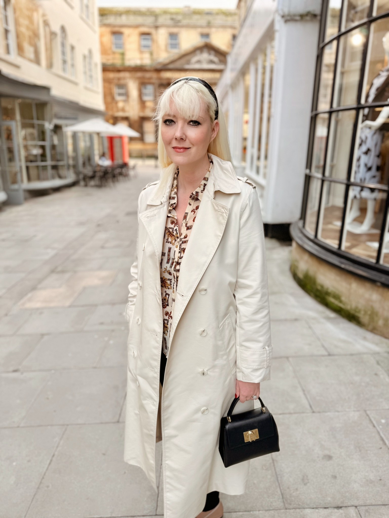 Spring styling essentials - a light stone-coloured trench coat, a headband, top handle bag and lashings of eyeliner! See the products list for my favourite pieces. 

#LTKuk #LTKeurope #LTKspring