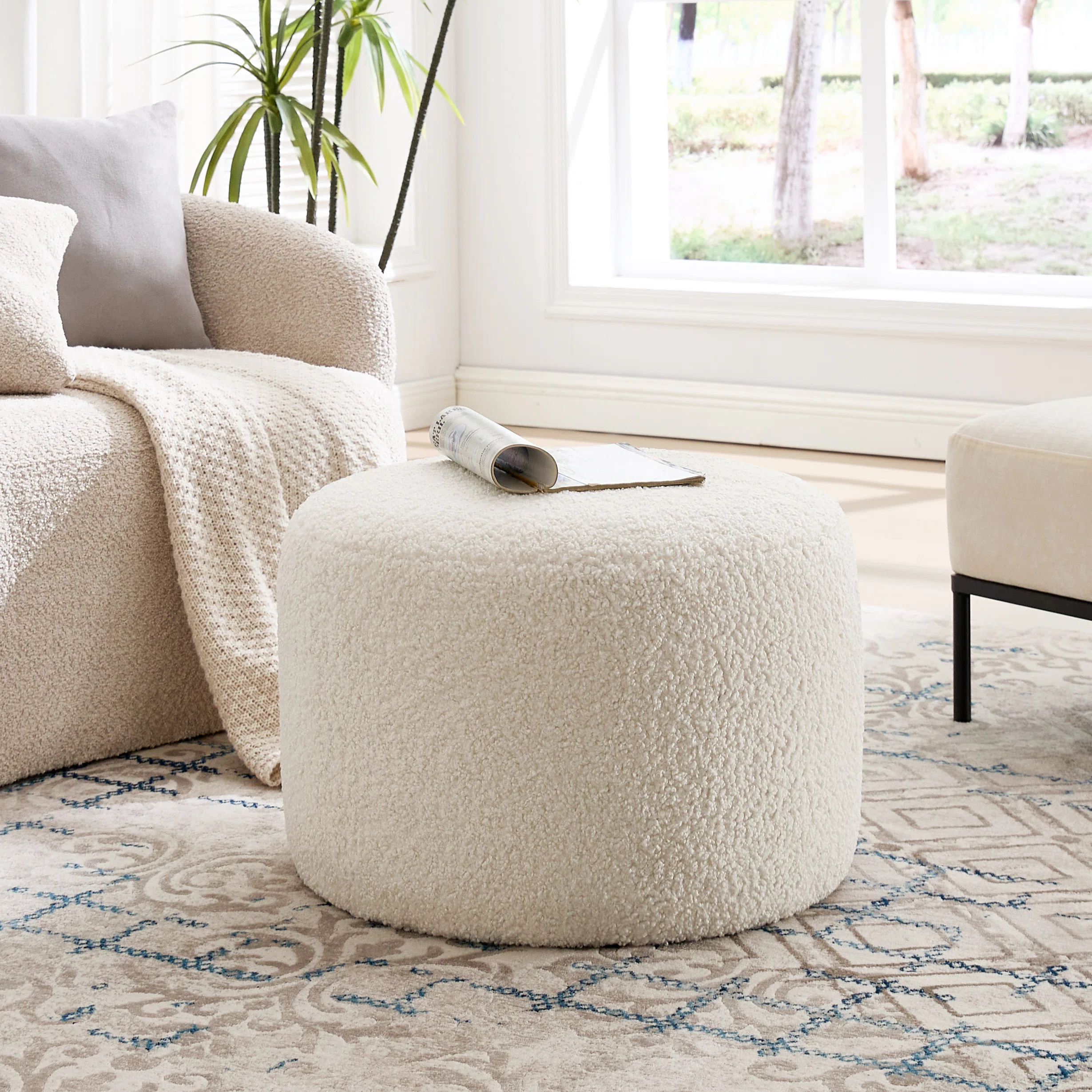 Regeani 24" Modern Round Upholstered Pouf Ottoman | Wayfair North America
