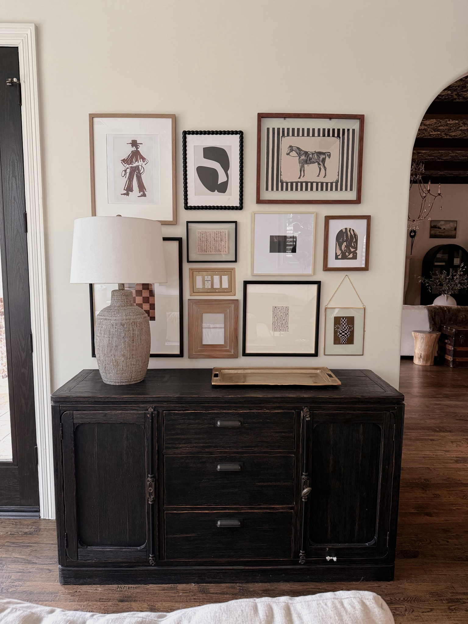 Transitional modern gallery wall with budget friendly artwork from Etsy and Target frames. 

#LTKHome