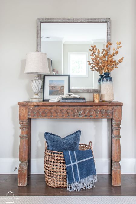 FALL | fall entryway styling with blue and orange 💙 paint color is SW Agreeable Gray and console table is a local find!
•
Shop this fall console table decor by clicking the link in my bio or by following me in the @shop.ltk app!
•
•
•
•
#entryway #consoletable #entry #consoletabledecor #traditionaldecor #fallvibes #fallmood #fallstyle #falldecor #falldecoration #falldecorations #falldecoratingideas #falldecorideas #homestyling #homedecorinspo #homedecorideas #homeideas #homeinteriordesign #homedecorblog #housedecoration #homedecoration #homedecorating #interiordecorating #interiordecoratingideas #fall #fall2022

#LTKhome #LTKSeasonal