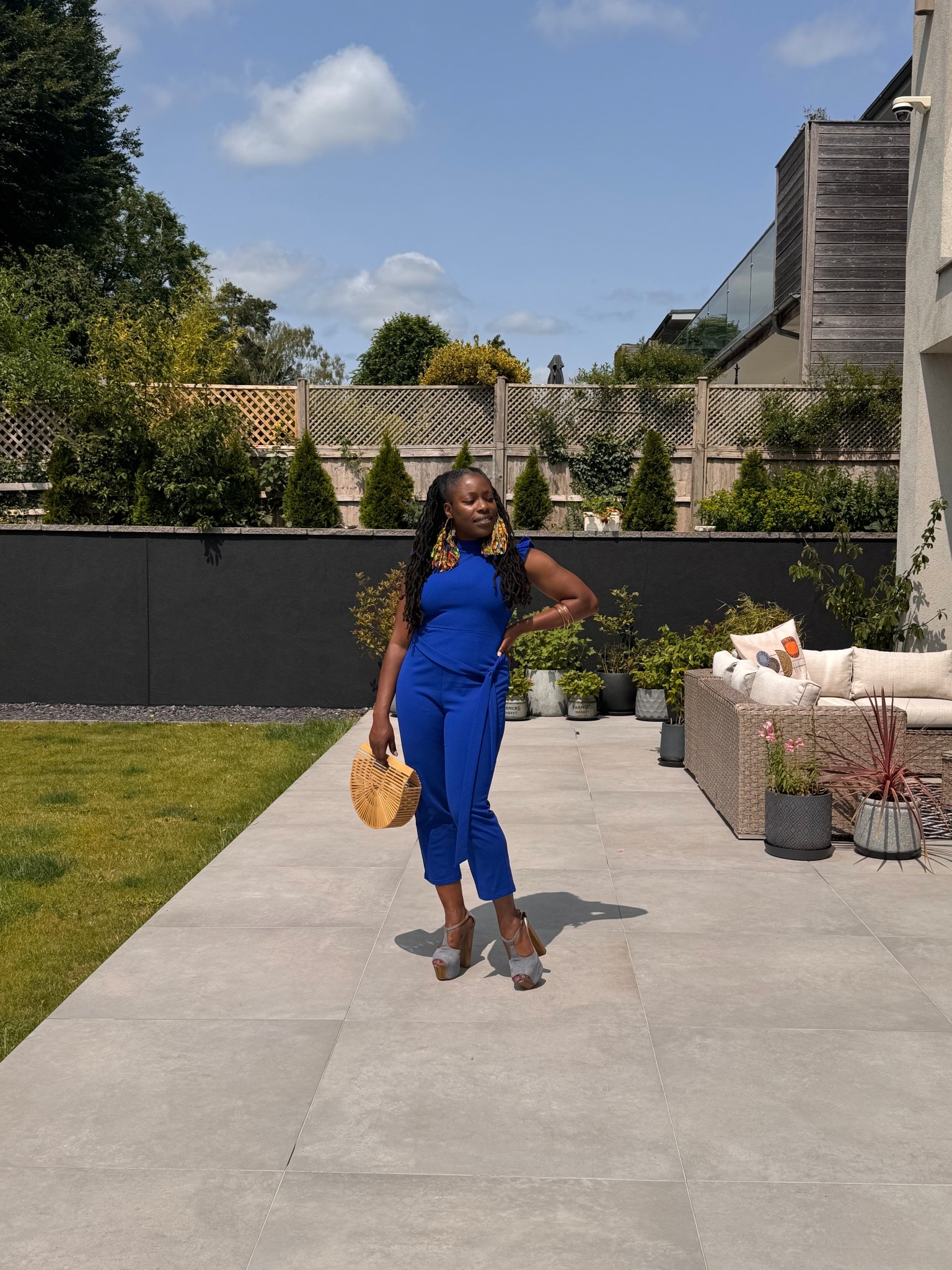 Oh, we are outside! Unfortunately, I just checked and these blue Jessica Simpson shoes are out of stock. If you like the style, they have them available in different colors.

I am wearing a small in the romper because I have no buttons, and it is stretchy!

You are going to see this handbag in almost all my summer photos! I love this bamboo thang! 

Oh, and these fabric earrings are giving me the life I needed right now.

Get into it!

I included the outdoor sectional for your next home gathering. You’re welcome.



#LTKStyleTip #LTKSummerEdit #LTKOver40