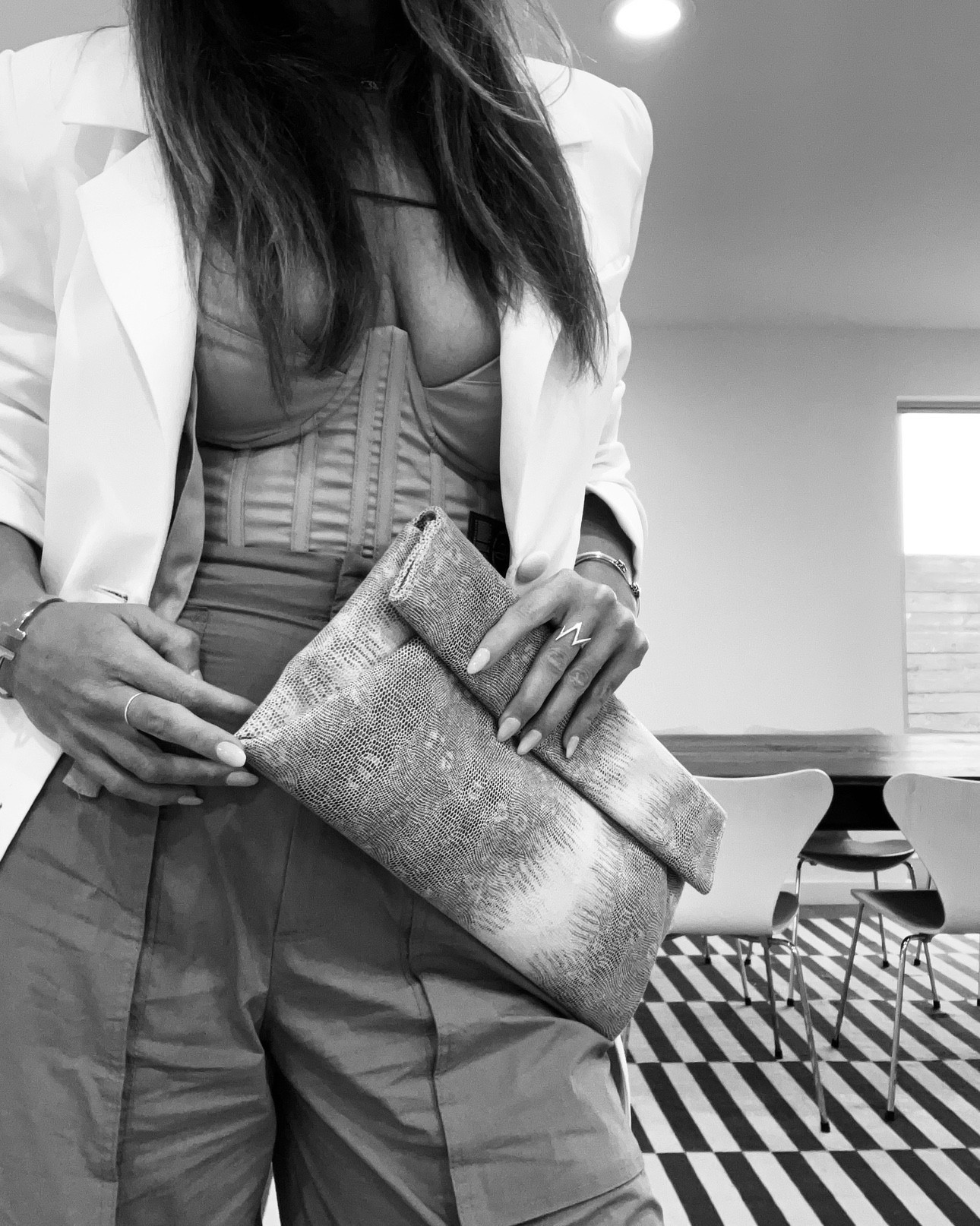 Combine class with some sass to get this look. I find when wearing a more revealing top or bustier style top when adding a blazer over top it elevates the look. Snake skin clutch for the win and a high wasted cargo pant is a must have for this spring season coming up soon enough. 
#blazersandbustier #lookoftheday 

#LTKSeasonal #LTKstyletip #LTKover40