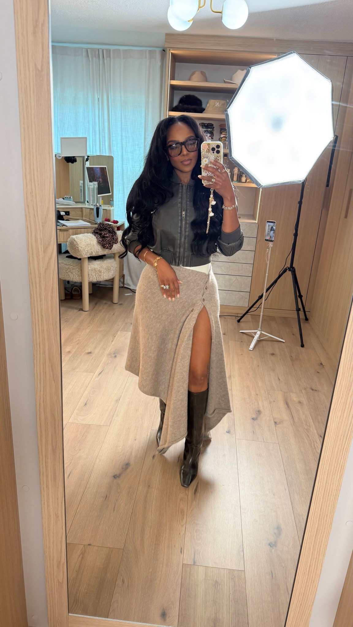 Chic with an edge — the mix of a fitted faux-leather jacket and a soft knit wrap skirt creates the perfect balance of structure and movement. The high slit gives it that feminine drama while still feeling wearable for dinner, date night, or elevated daytime plans.

Tall boots ground the look beautifully, and the neutral palette keeps everything luxe and minimal.

📏 Sizing: jacket (small), skirt (small), boots (true to size)  
Height 5'4" · 138 lbs · 34D · 27" waist · 40" hips

Keywords: leather jacket outfit, knit wrap skirt look, tall boots outfit ideas, neutral fall style, elevated casual outfits, feminine edgy fashion, Amazon fashion finds

Favorite to revisit later.

Follow me on Instagram and YouTube @kirasfashionfinds