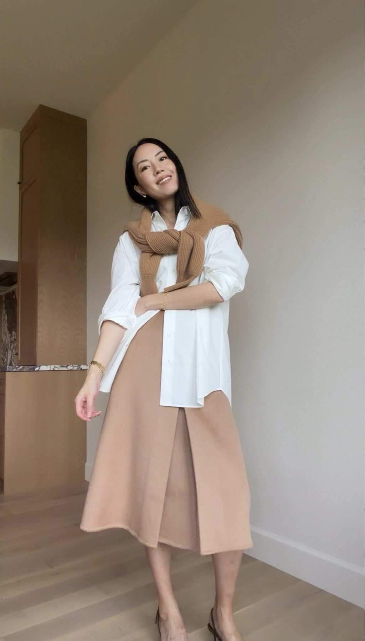 Classic winter workwear: button down shirt, long wool skirt, cashmere sweater, and low heels. 

#classicstyle
#winteroutfit
#winterofficeoutfit
#workwear
#officeattire

#LTKSeasonal #LTKWorkwear #LTKHoliday