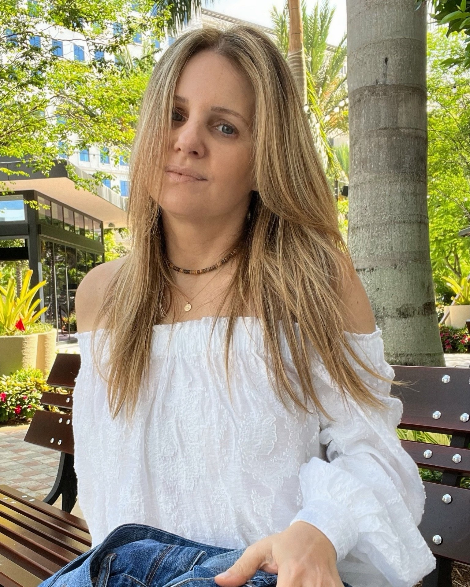 White off the shoulder eyelet blouse w brown puka style choker + gold pendant necklaces stacked

#LTKSaleAlert #LTKootd #LTKFestival