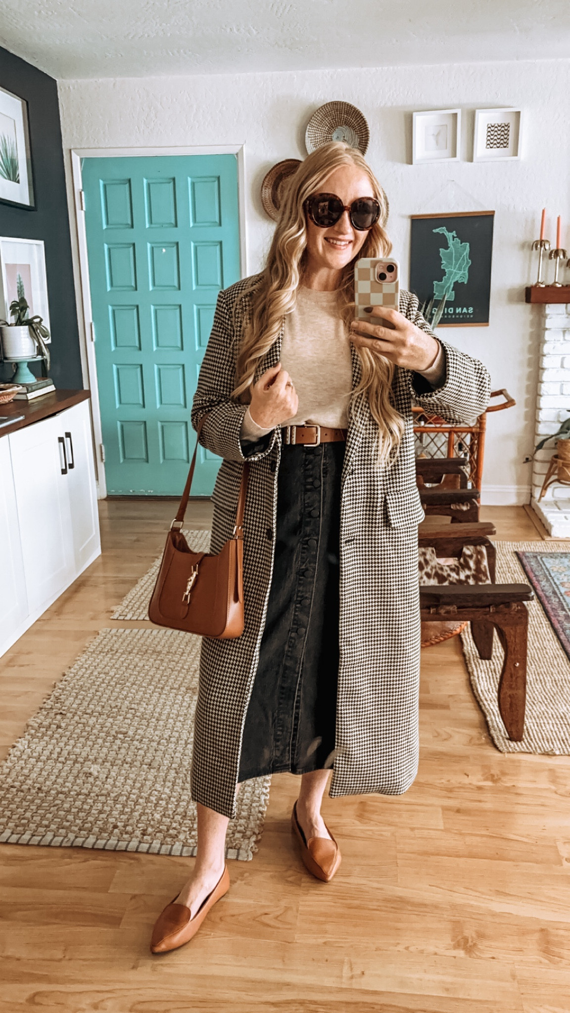 The cutest FALL COAT from Target! 🍂 Beautiful weight, comes in a bunch of colors, lined, pockets, etc - truly such a staple fall and winter jacket! Styled dressy here with a button down denim skirt, camel belt, camel flats and purse!  

Sized down in jacket to S at 150 lbs and 5’7.” Could probably still fit thick sweaters underneath. Runs oversized! Wearing size 8 in skirt and XL in sweater, sweater runs small. 

Fall coats, target fall finds, target finds, fall style, fall coats, winter coats, fall jacket haul, target fall style, houndstooth jacket, wool jacket, target seasonal, staple fall essentials, fall staples, fall wardrobe must haves, fall essentials, fall style, long coat, trench coat, wool jacket, church fit, classic fall outfit, classic style, chic outfit, old money style, old money aesthetic 

#LTKSeasonal #LTKStyleTip #LTKFindsUnder50