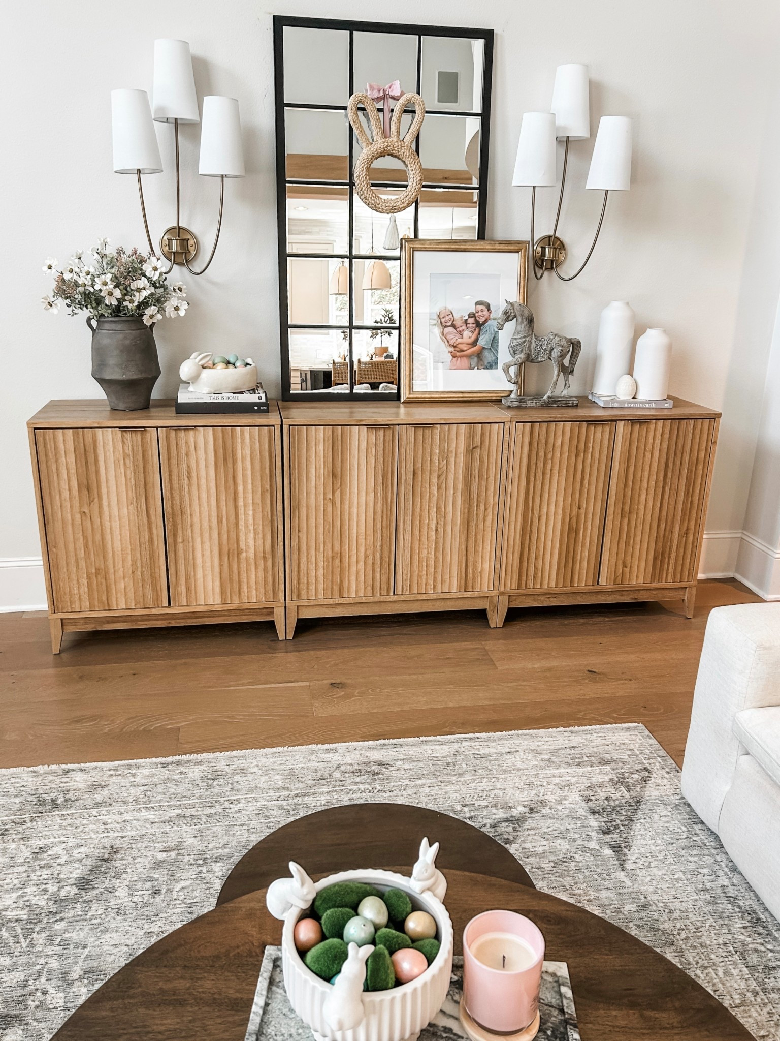 Family room sideboard decorated for Easter 🐰 🐣 





Storage cabinet
Wall mirror
Wall sconce 