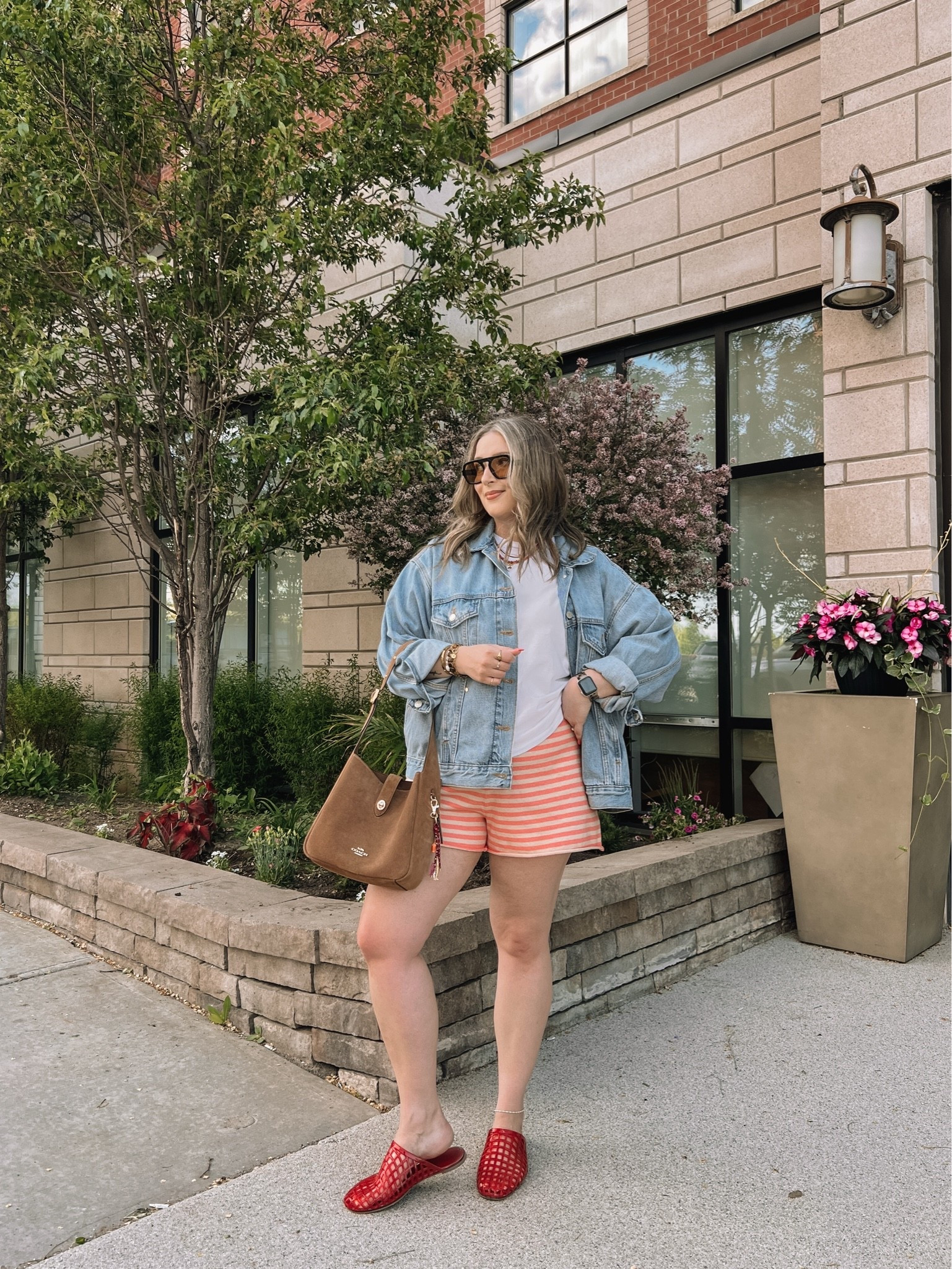 Comfy spring to summer outfit! Wearing my usual L in the striped knit shorts. Sized up to XL in the denim jacket for an oversized fit. Linked similar white tees. Jelly shoes are quite comfy, I’m a 9.5-10 and wear a 10. Canadian shoe link under “similar products”

#LTKsummer #LTKsale #LTKmidsize