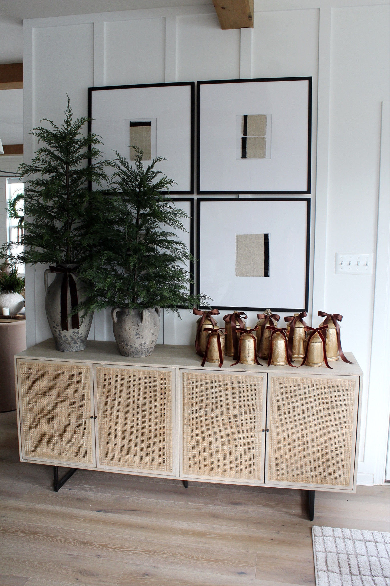 Sideboard , rustic bells, Christmas trees, vase photo frames

#LTKHoliday #LTKHome #LTKSeasonal