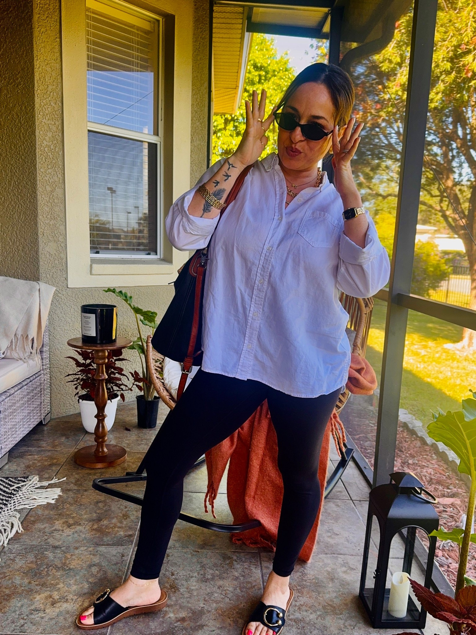 This is my “I have errands, but I still care” outfit   Casual but elevated outfit of the day. Leggings are from Aritzia. The golden line, shirt is from H&M, Sunnies are from TikTok shop and the black sandals are Thrifted. I’m wearing a size 6 in the leggings.

#LTKStyleTip #LTKActive