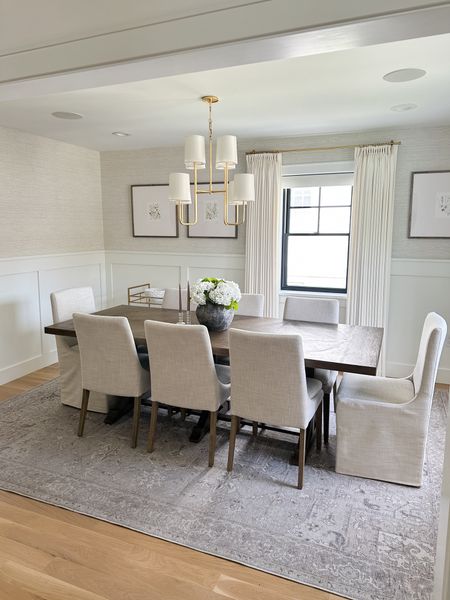 Dining room design, trestle dining table, upholstered chairs, Ruggable washable rug, gold shaded chandelier, grasscloth wallpaper 

#LTKHome #LTKStyleTip #LTKSaleAlert