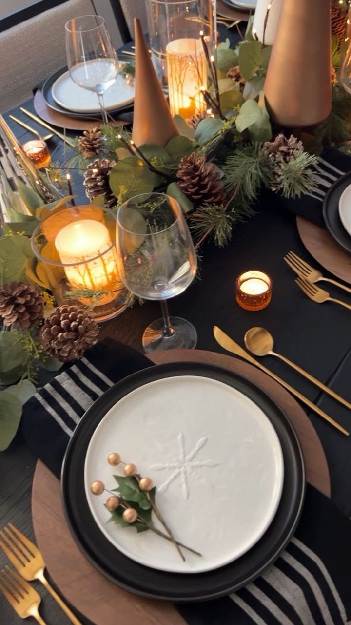 Neutral, organic modern Christmas tablescape! Fur, wood tone charger plates, pine cone centerpiece, black, white, gold, and brown tablescape

#LTKHome #LTKSeasonal #LTKHoliday