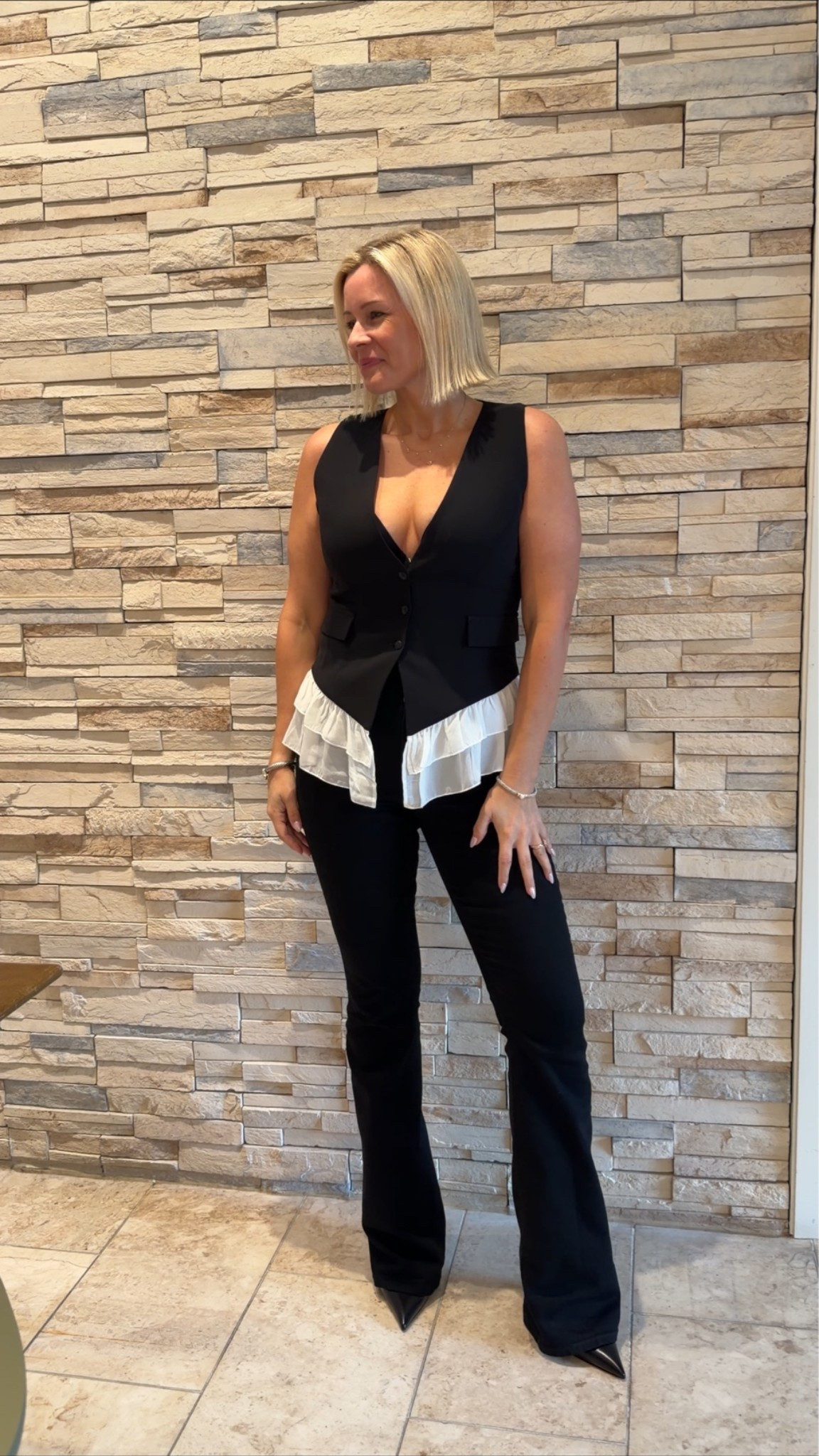 These jeans and this vest are everything. I’m wearing a 28 in jeans and a medium in the vest!
