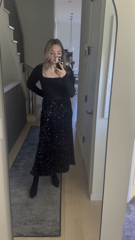 This sequin skirt is SO FAB! ✨ Truly cannot believe it’s Old Navy. Full price is $35, but it’s 35% off. Truly a steal!

FYI - it runs big in the waist! I’m wearing the Medium here, but just ordered the Small. If you have a smaller waist, I would size down. If not, stick with your regular size.

The fabric is STRETCHY and so comfortable! It’s a velvet material covered in sequins, but it’s fully lined with a soft jersey material. 

Perfect for holiday parties! Outfit options and styling possibilities are endless. 

#LTKVideo #LTKCyberWeek #LTKHoliday