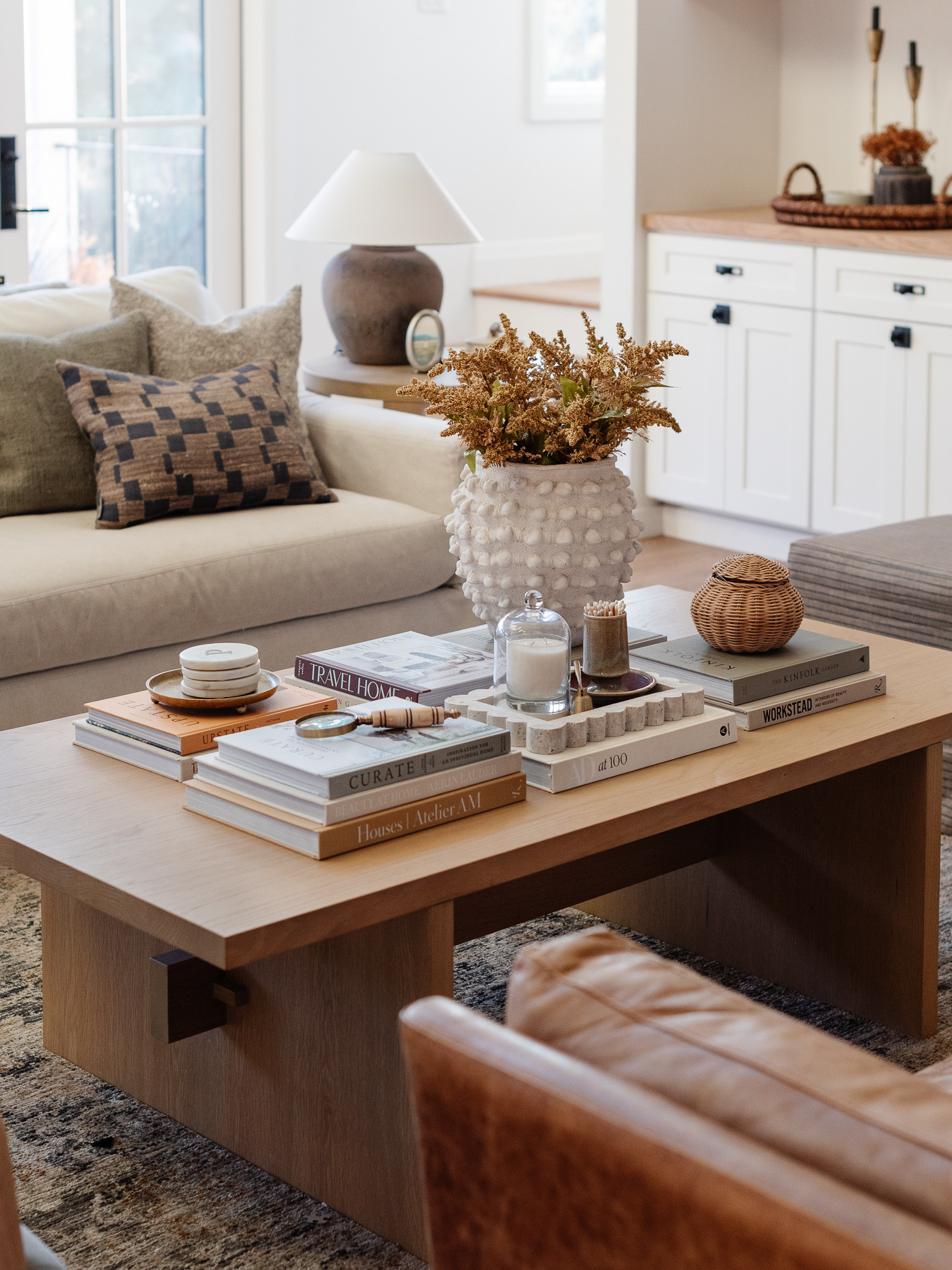 Cozy living room details 🤎

Living room, coffee table, fall decor, coffee table decor, coffee table books, faux stems, warm accents, neutral home, living room decor ideas