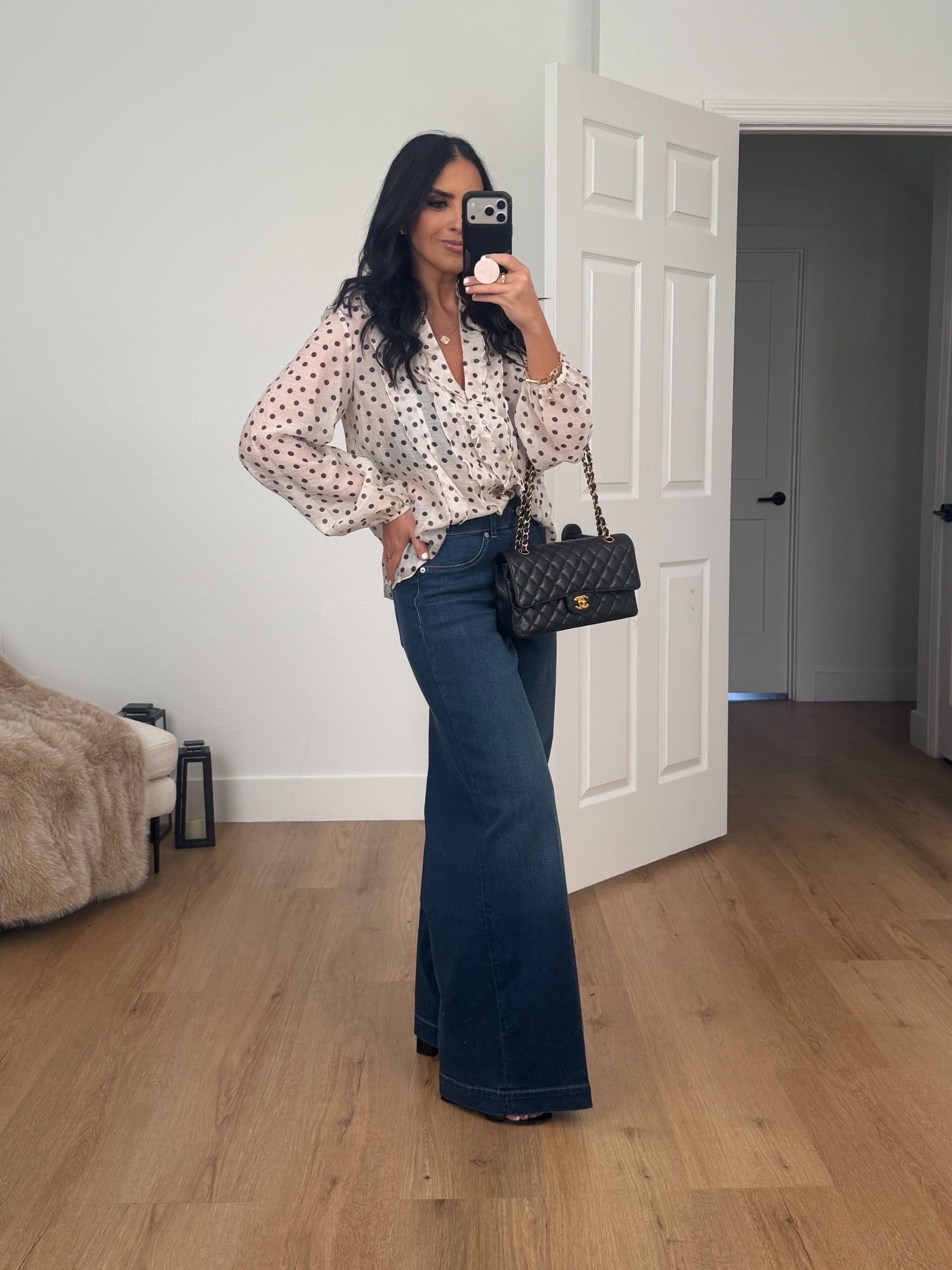 Zara ruffled polka dot blouse wearing size small. Spanxshape Everywear Wide Leg Jeans wearing size medium. 