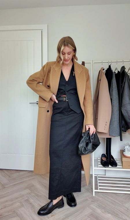 Black maxi skirt outfit - leather loafers and camel maxi coat - great for work wear and dinner dates #maxiskirt #camelcoat #classicstyle 

#LTKSeasonal #LTKshoecrush #LTKworkwear