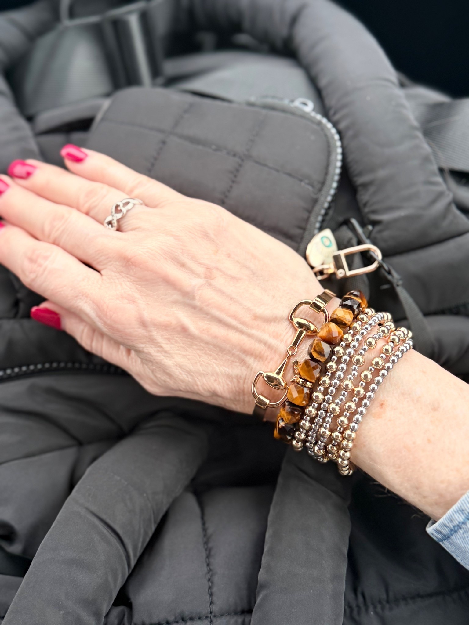 Favorite bracelet stack. 

Horse bit bracelet. Silver and gold bracelet brown bead bracelet.

#LTKOver40 #LTKootd