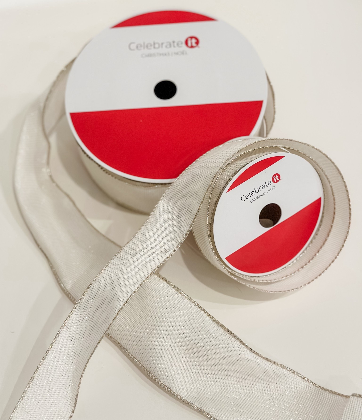 After a *very* long 2024 holiday season, Michaels FINALLY brought back my all-time favorite ribbon. It’s the most gorgeous creamy white with subtle gold shimmer. Wired, two different widths, and SO versatile year round. No gatekeeping, no notes, not sponsored, and pleeease don’t buy it all! 😅

#LTKSeasonal #LTKFindsUnder50 #LTKHome