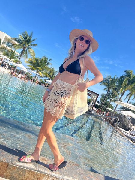 Amazon beach vacation must haves! 

-black two piece swimsuit (I ordered two of these so I could get different sized top/bottom) wearing XL top, small bottoms

—crochet skirt cover up 

—packable mesh beach bag 

#LTKitbag #LTKstyletip #LTKswim