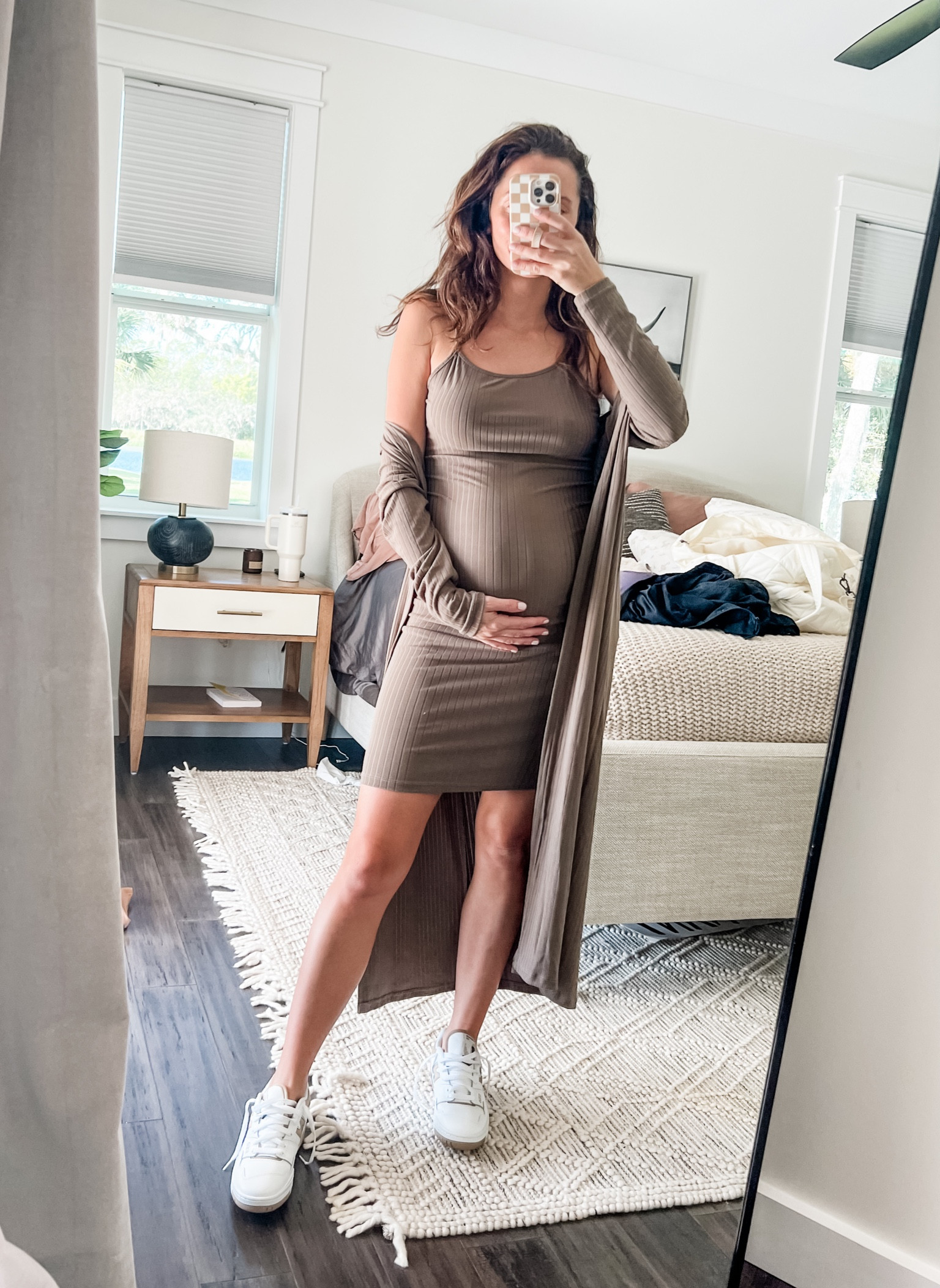 Bump outift= dress cardigan set  + sneakers. Love this comb and super comfy! Pregnancy fit. Wearing a size small in the set. Sized 1/2 size down in the sneakers

#LTKbump #LTKshoecrush #LTKHoliday