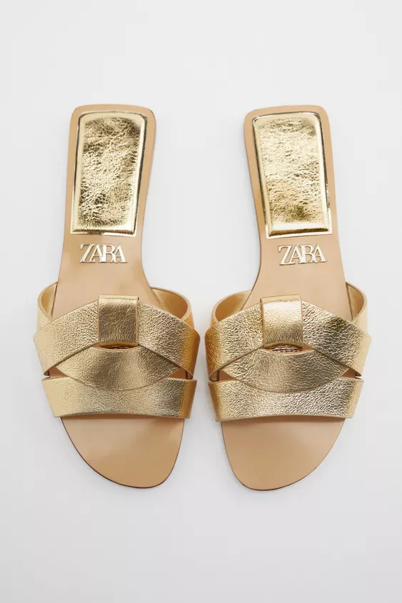 Flat leather sandals with crossed straps at front.Sole height: 0.4 inches (1 cm) | Zara US