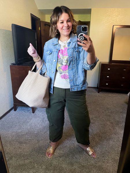My travel outfit of the day to go straight from the car to American Girl with my kiddos 🥰 My graphic tee is Anthro but I’ve also linked a similar $10 option! These barrel leg cargo pants are a favorite and on sale today along with my favorite jean jacket. 🙌🏻 Wearing XL in everything! 

#LTKfindsunder100 #LTKplussize #LTKtravel