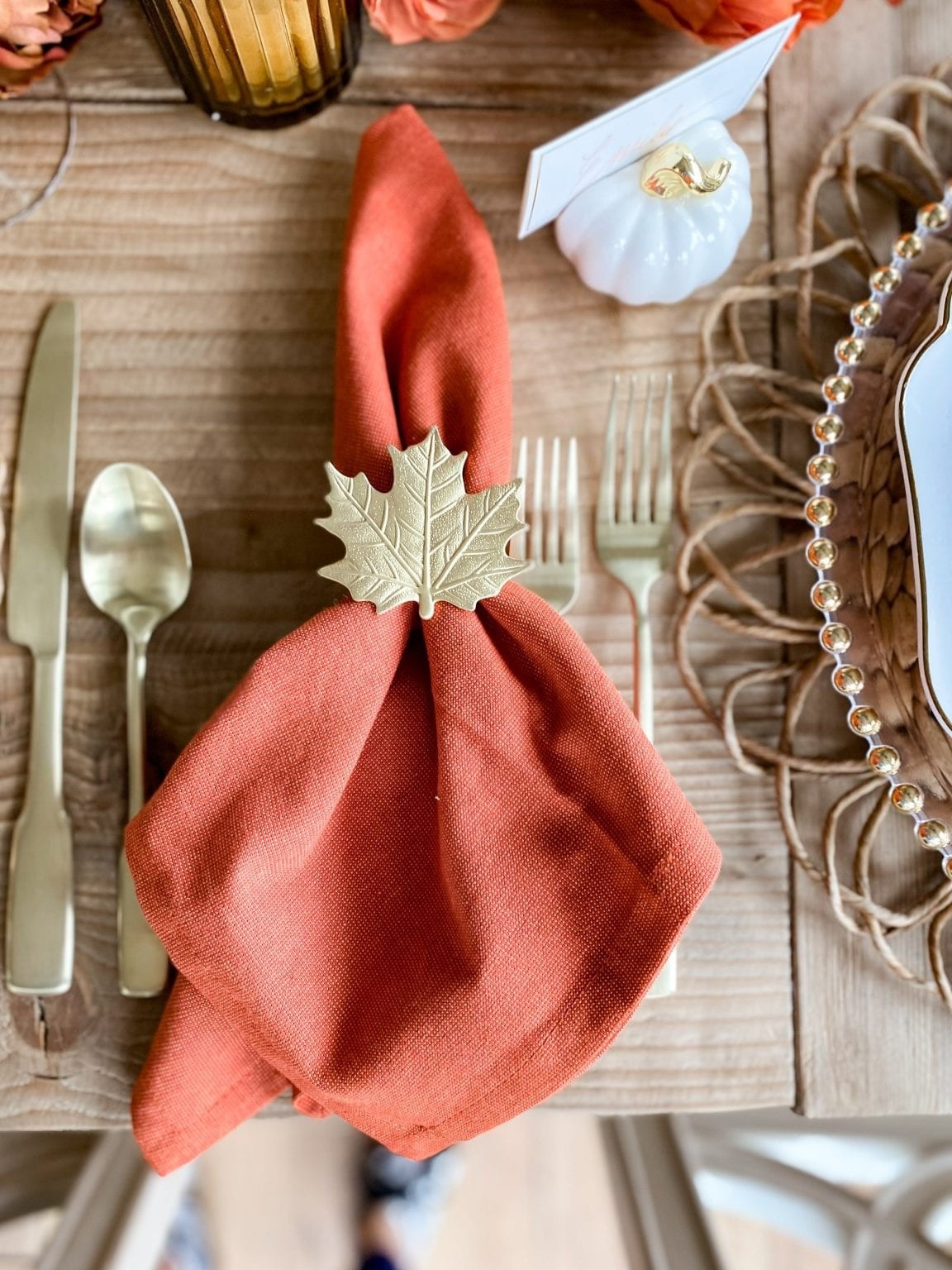 The darker orange color of the solid napkin contrasts nicely with the stark white dinnerware.

#LTKHoliday #LTKSeasonal #LTKHome