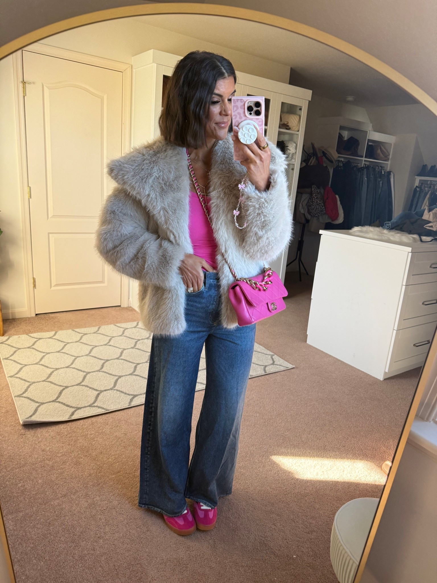 size small in fur and long sleeve Sized down one to a 25 in jeans

#LTKFindsUnder100 #LTKSeasonal